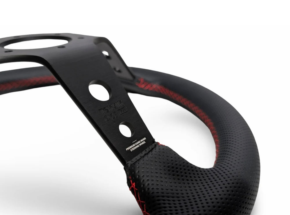 TK #1 。Steering Wheel 。Red Stitching 。Perforated Leather