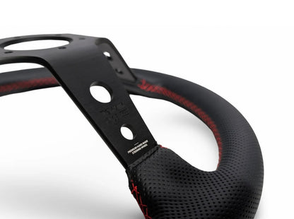 TK #1 。Steering Wheel 。Red Stitching 。Perforated Leather